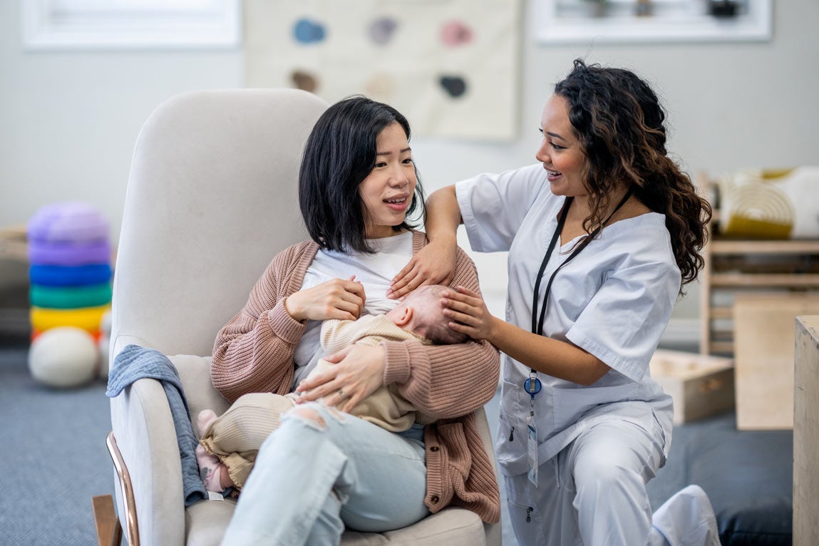 Mom with baby at lactation appointment