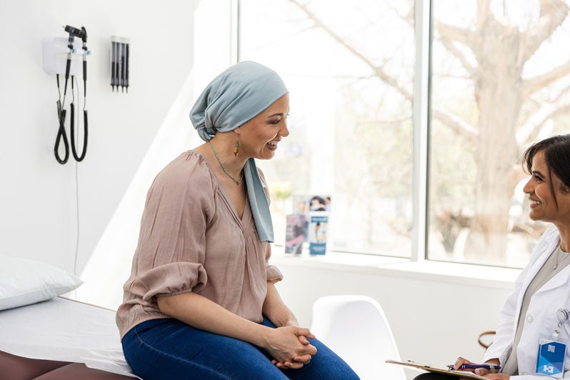 cancer patient meets with doctor