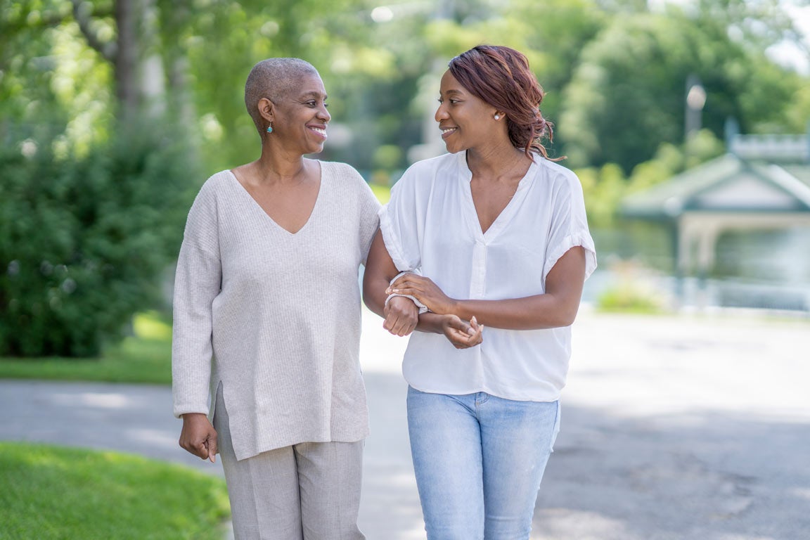 Mom and daughter walking