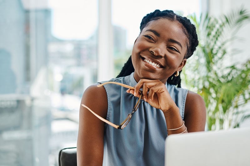 African-American woman smiling in office