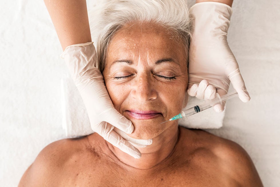 Senior woman getting botox